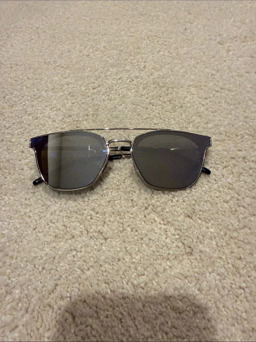 Saint Laurent SL 28 Metal sunglasses in a silver frame with mirrored lenses